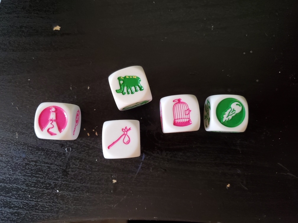 three red and two green story dice